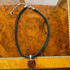 Silpada Leather, sterling and amber pendant.